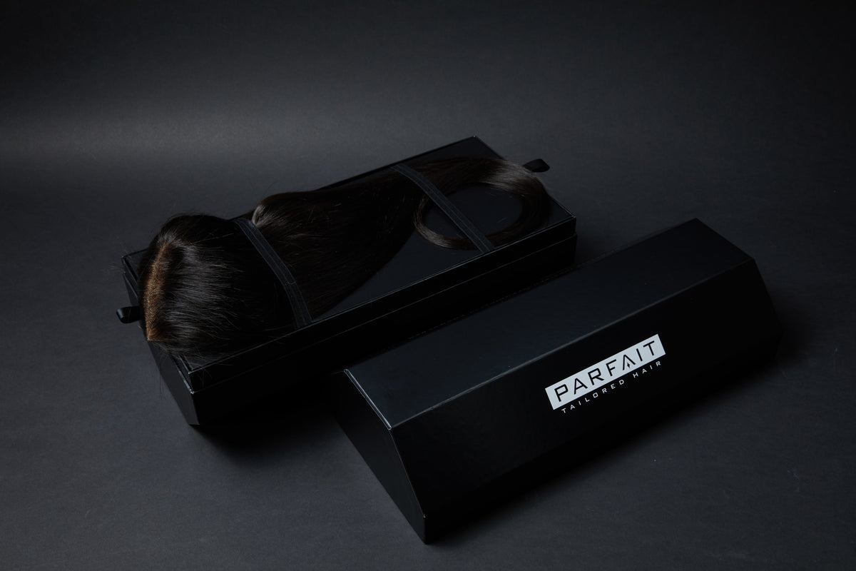 Parfait wig on top of branded packaging
